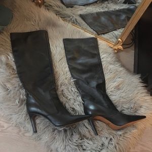 Buttery soft leather knee high boots.